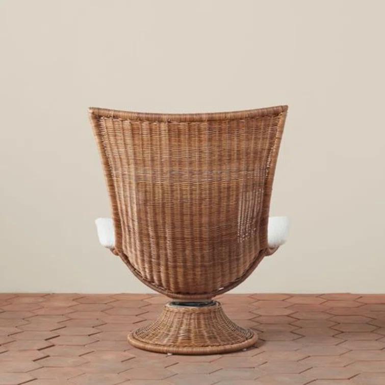 Woven Healdsburg Swivel Chair in Rattan | Perigold