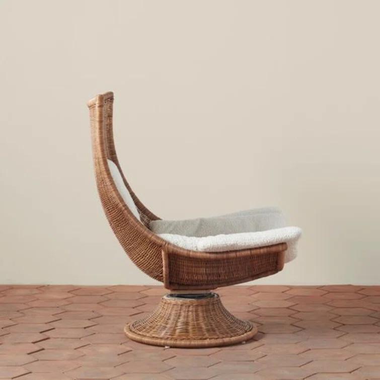 Woven Healdsburg Swivel Chair in Rattan | Perigold