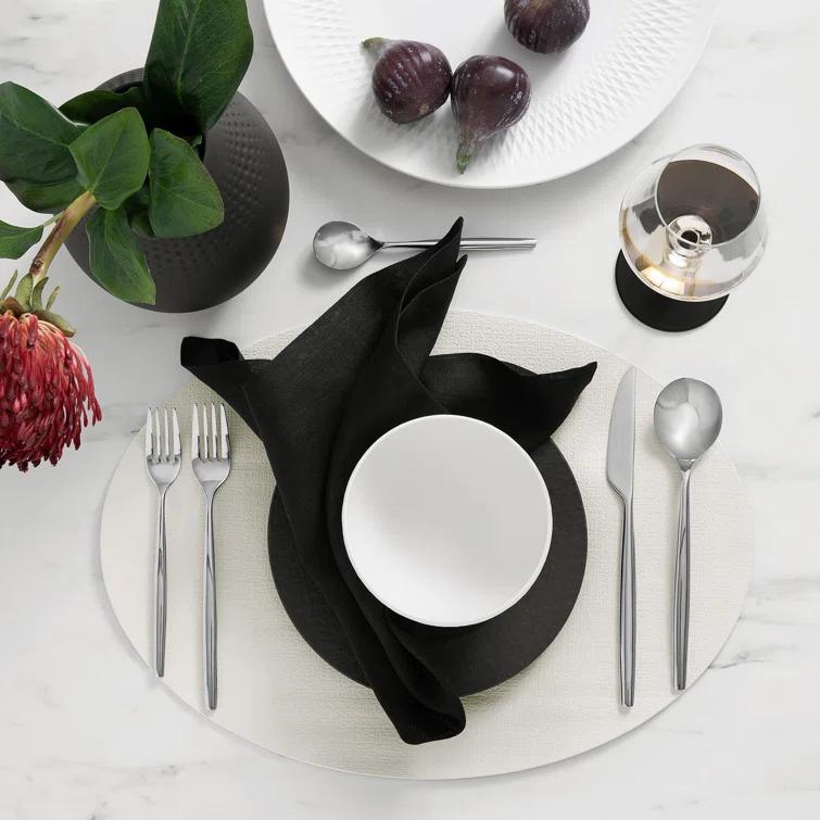 Manufacture Rock Oval Faux Leather Reversible Placemat (Set of 4)
