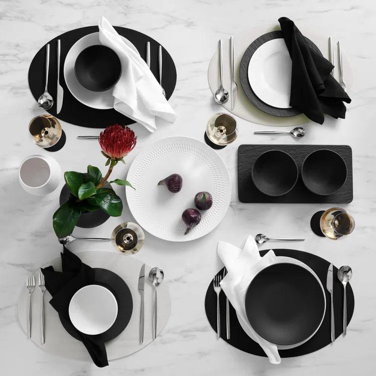 Manufacture Rock Oval Faux Leather Reversible Placemat (Set of 4)