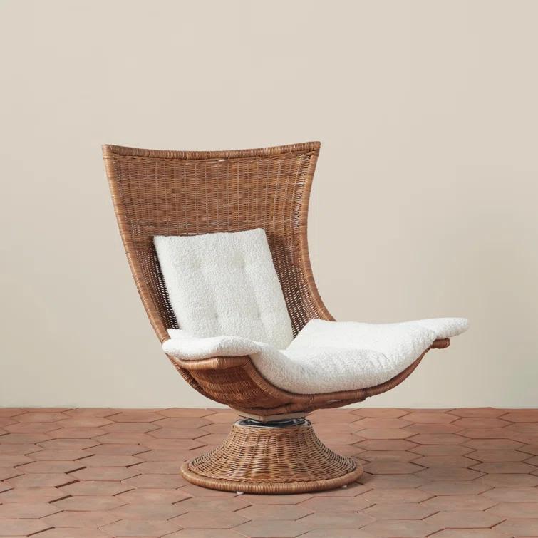 Woven Healdsburg Swivel Chair in Rattan | Perigold