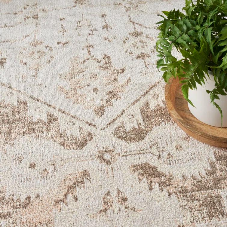 Haydel Oriental Machine Washable Power Loom Polyester Area Rug in Beige