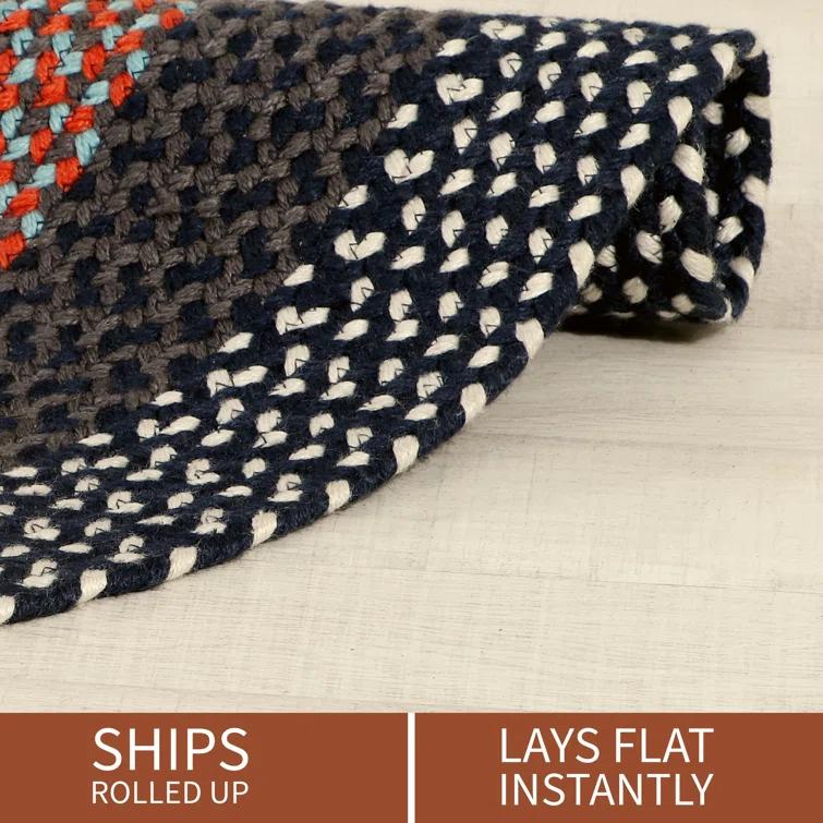 Enika Hand Braided Red/Blue Area Rug