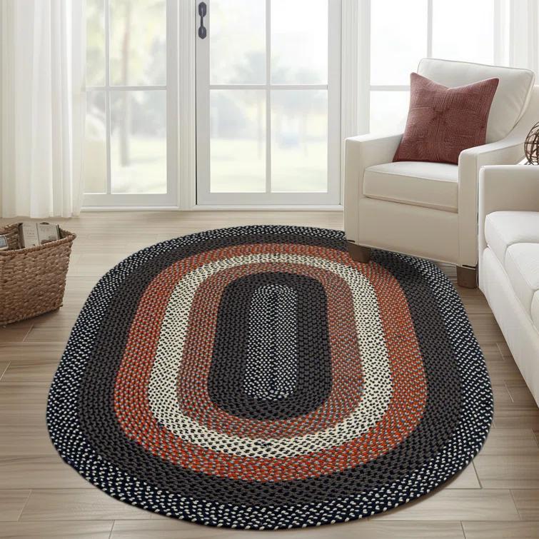 Enika Hand Braided Red/Blue Area Rug