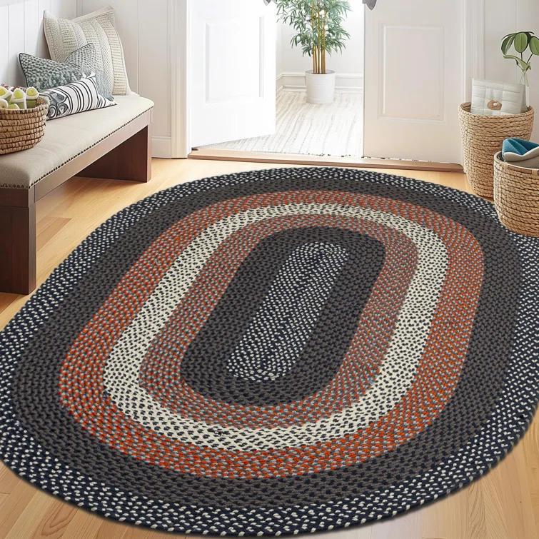 Enika Hand Braided Red/Blue Area Rug