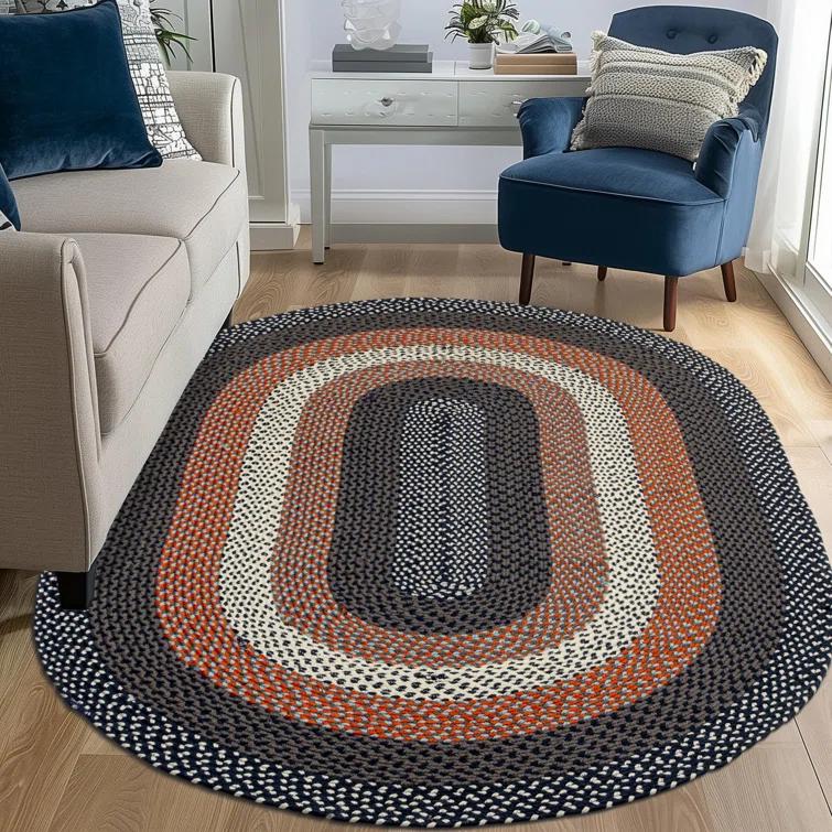 Enika Hand Braided Red/Blue Area Rug