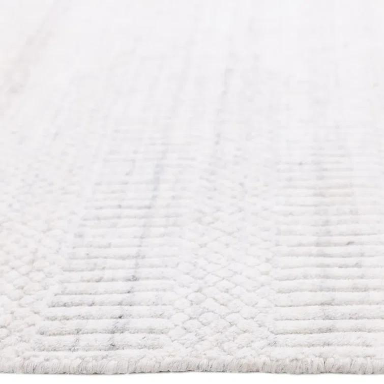 Handmade Ivory Wool and Viscose 9' x 12' Area Rug