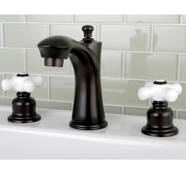 Kingston Brass Victorian Two-Handle 3-Hole Deck Mount Widespread Bathroom Faucet with Retail Pop-Up Drain