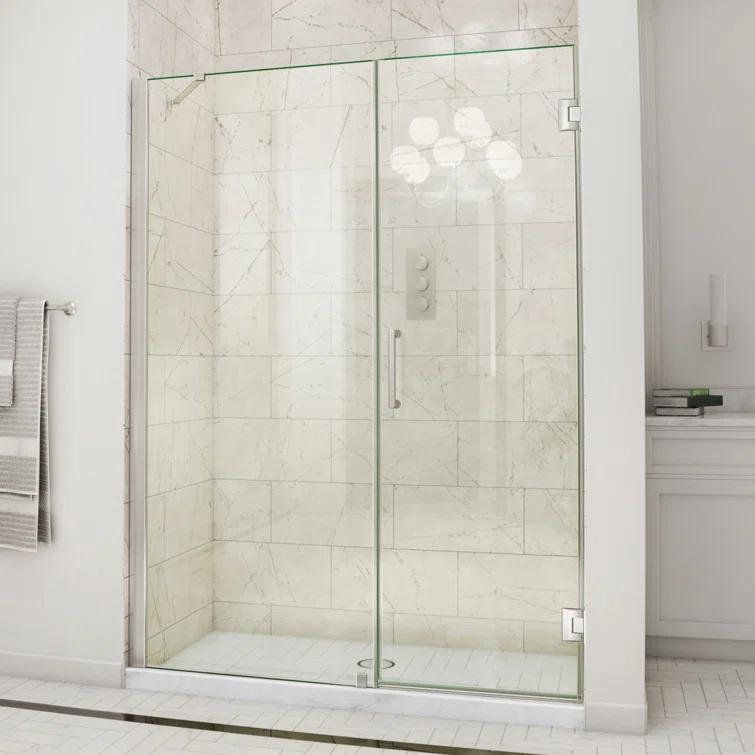 Unidoor 57" W x 72" H Hinged Frameless Shower Door and Fixed Panel with ClearMax Glass Treatment