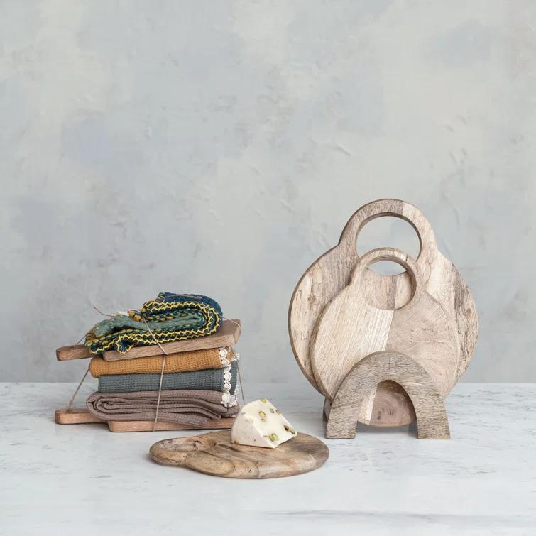 Creative Co-Op 3-Piece Round Mango Wood Cutting Boards In Various Sizes With Stand