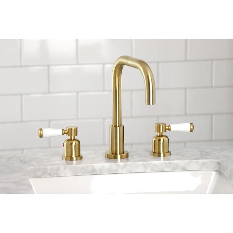 Kingston Brass Two-Handle 3-Hole Deck Mount Widespread Bathroom Faucet with Brass Pop-Up Drain