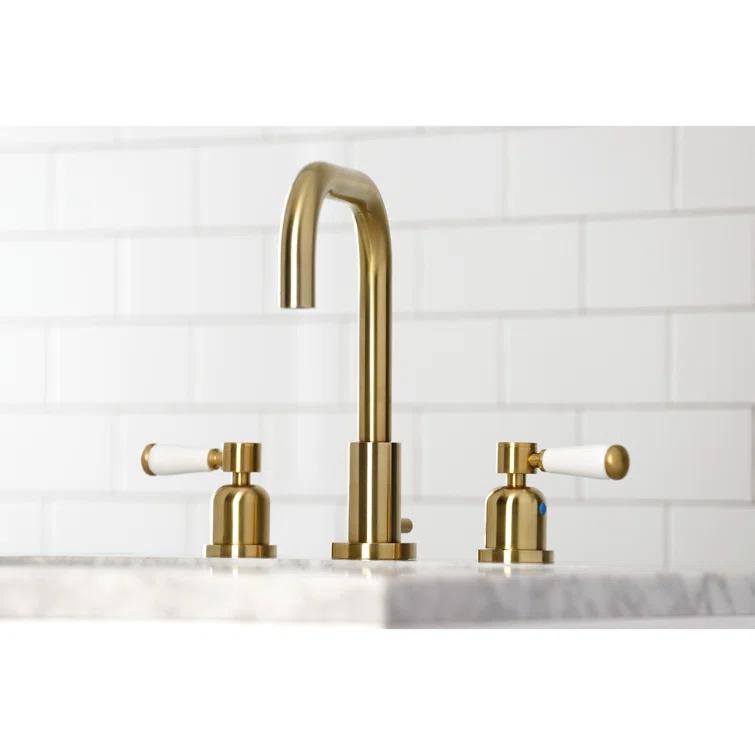 Kingston Brass Two-Handle 3-Hole Deck Mount Widespread Bathroom Faucet with Brass Pop-Up Drain