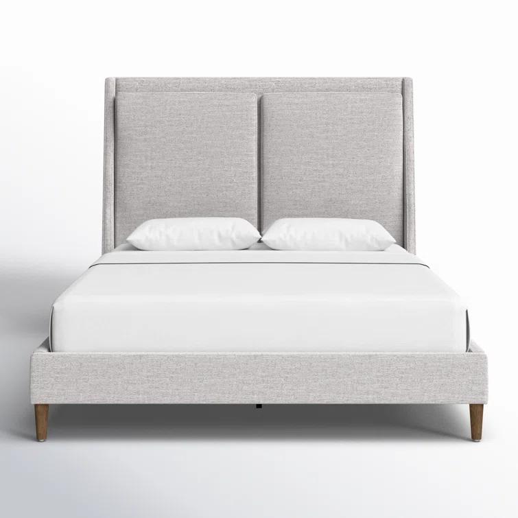 Gray Upholstered Queen Bed with Tapered Headboard and Wood Legs