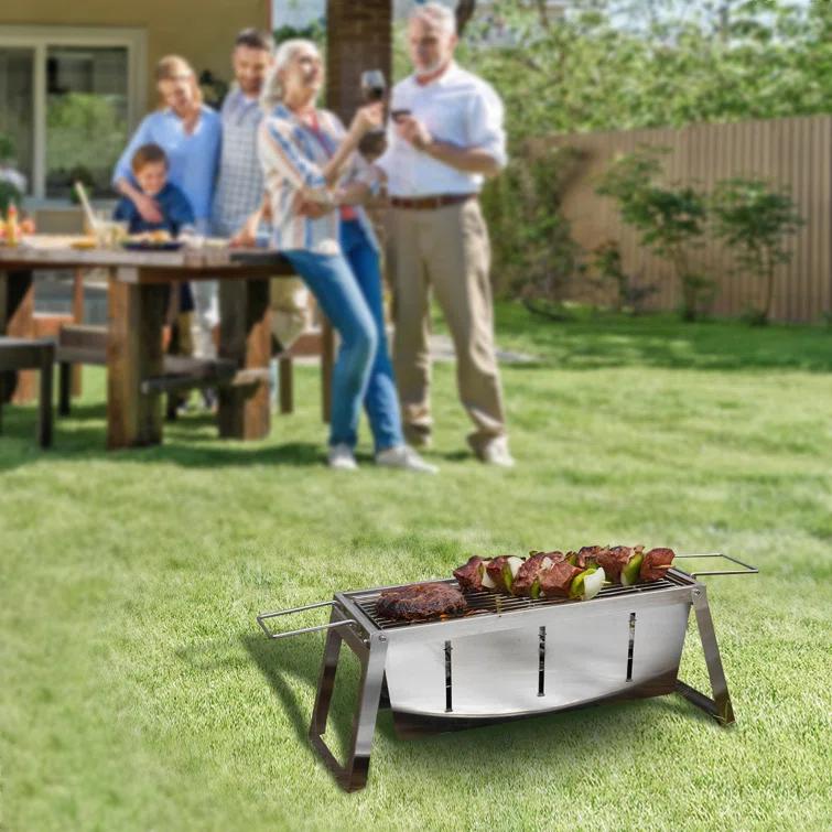 Fire Sense Foldaway Charcoal Grill, Stainless Steel ,Charcoal Grate & Carry Bag Included