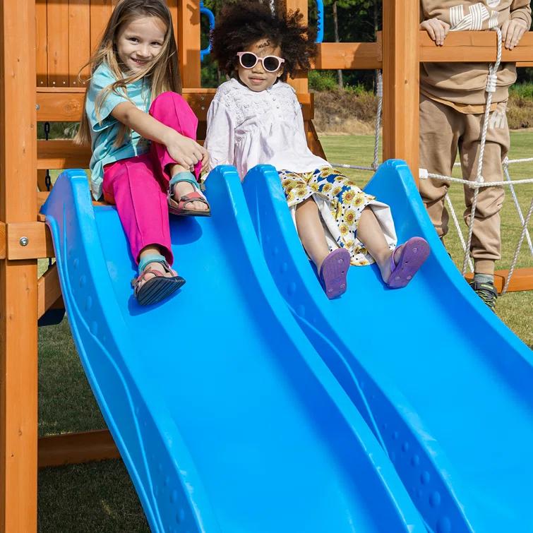 Dolphin Playground Dolphin Playground Luxury Cedar Playground Set: Double Wave Slide, 2-in-1 Table, Monkey Bars, Balance Beam, 3 Swings, Large Rock Wall, Wood Roof