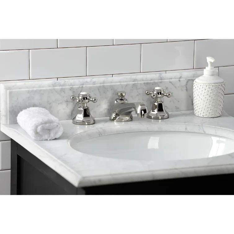 Kingston Brass Metropolitan Two-Handle 3-Hole Deck Mount Widespread Bathroom Faucet with Brass Pop-Up Drain