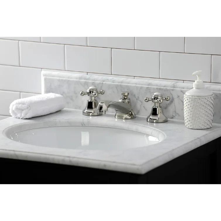 Kingston Brass Metropolitan Two-Handle 3-Hole Deck Mount Widespread Bathroom Faucet with Brass Pop-Up Drain