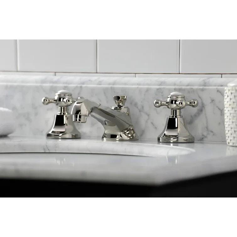 Kingston Brass Metropolitan Two-Handle 3-Hole Deck Mount Widespread Bathroom Faucet with Brass Pop-Up Drain