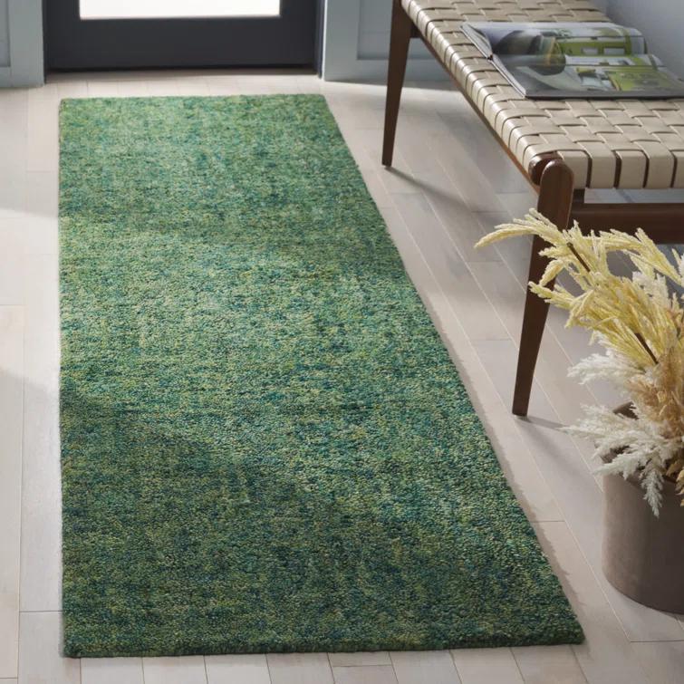 Handmade Green Wool and Synthetic 8' x 10' Area Rug
