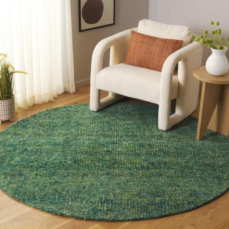 Handmade Green Wool and Synthetic 8' x 10' Area Rug