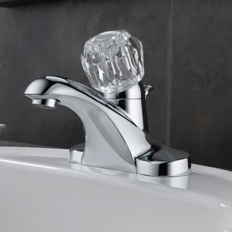Foundations Centerset Bathroom Faucet with Single Push Tilt Handle