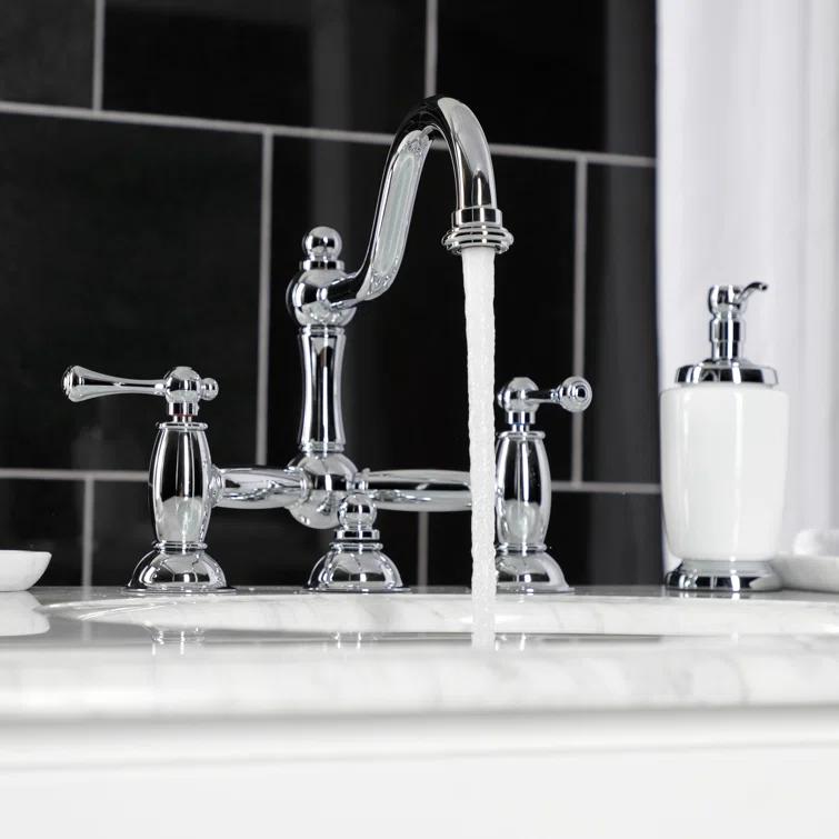 Kingston Brass Restoration Two-Handle 3-Hole Deck Mount Bridge Bathroom Faucet with Brass Pop-Up