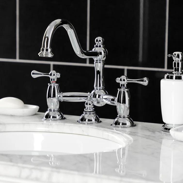 Kingston Brass Restoration Two-Handle 3-Hole Deck Mount Bridge Bathroom Faucet with Brass Pop-Up