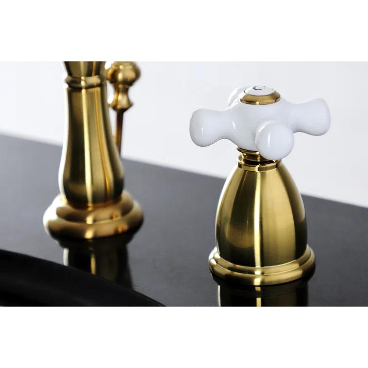 Kingston Brass KB1977PX Kingston Brass Heritage Two-Handle 3-Hole Deck Mount Widespread Bathroom Faucet with Brass Pop-Up Drain