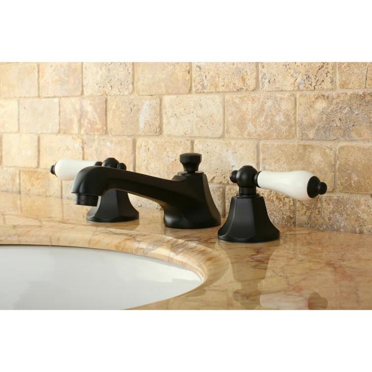 Kingston Brass Metropolitan Two-Handle 3-Hole Deck Mount Widespread Bathroom Faucet with Brass Pop-Up Drain