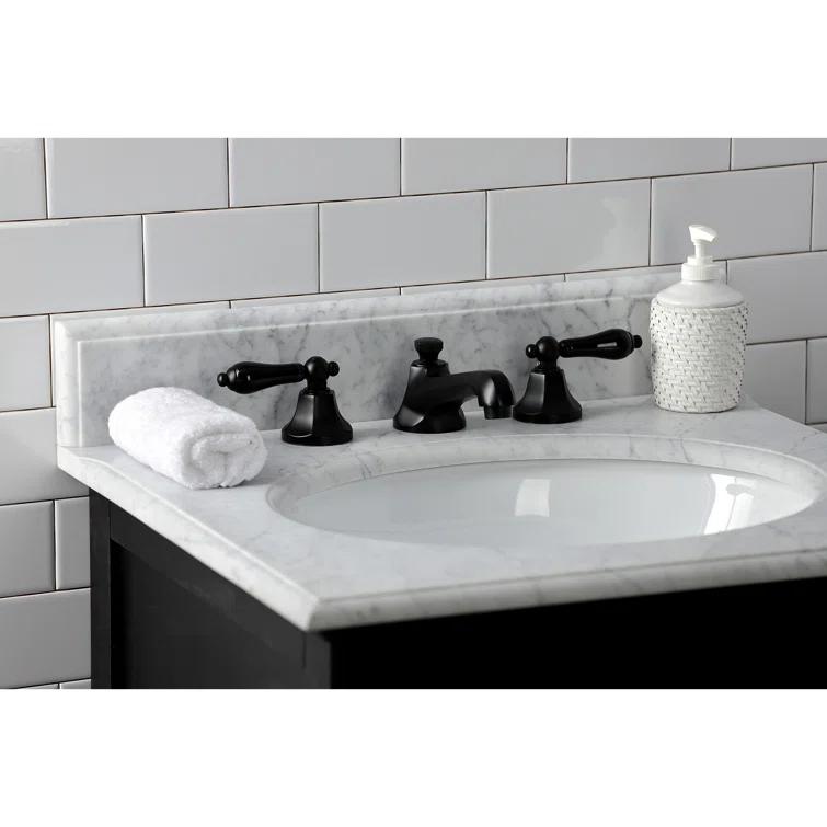 Kingston Brass Duchess Two-Handle 3-Hole Deck Mount Widespread Bathroom Faucet with Brass Pop-Up Drain