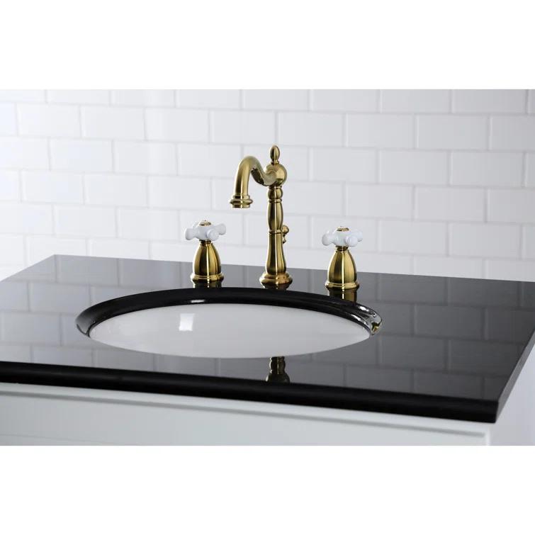 Kingston Brass KB1977PX Kingston Brass Heritage Two-Handle 3-Hole Deck Mount Widespread Bathroom Faucet with Brass Pop-Up Drain