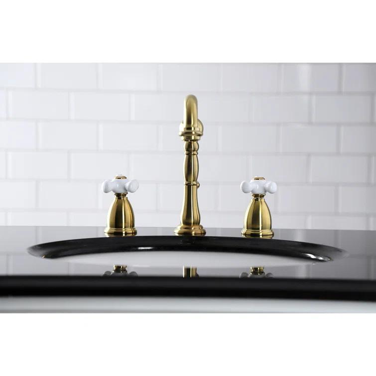 Kingston Brass KB1977PX Kingston Brass Heritage Two-Handle 3-Hole Deck Mount Widespread Bathroom Faucet with Brass Pop-Up Drain