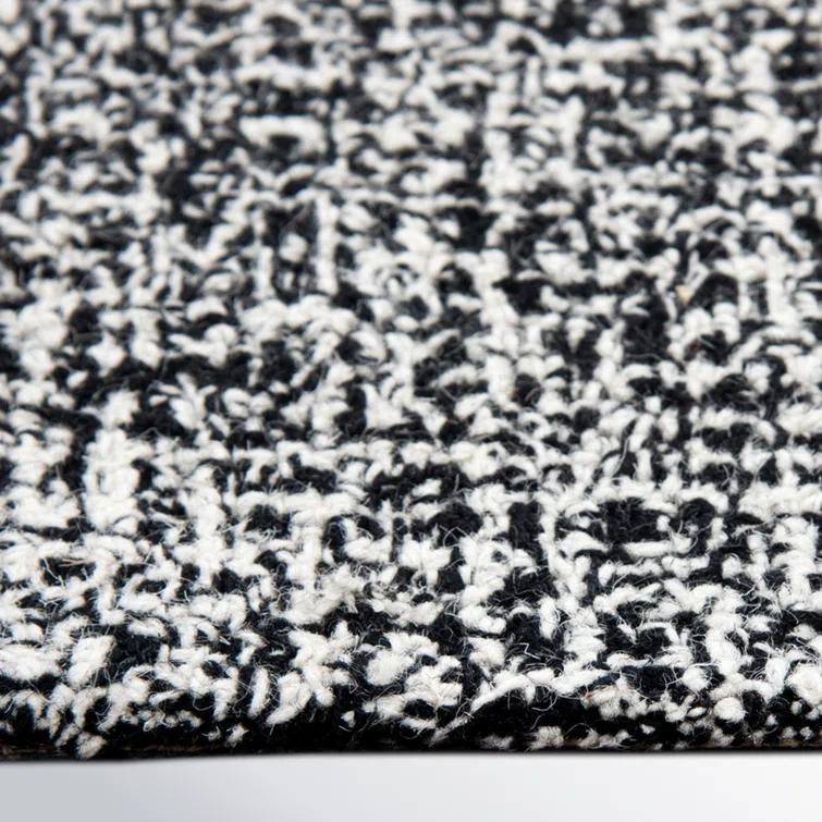Britley Handmade Tufted Wool Black/White Area Rug