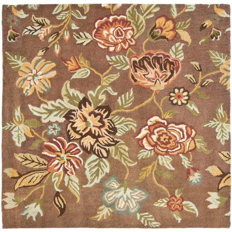 Emrick Hand Hooked Wool/Cotton/Latex Floral Rug in Brown