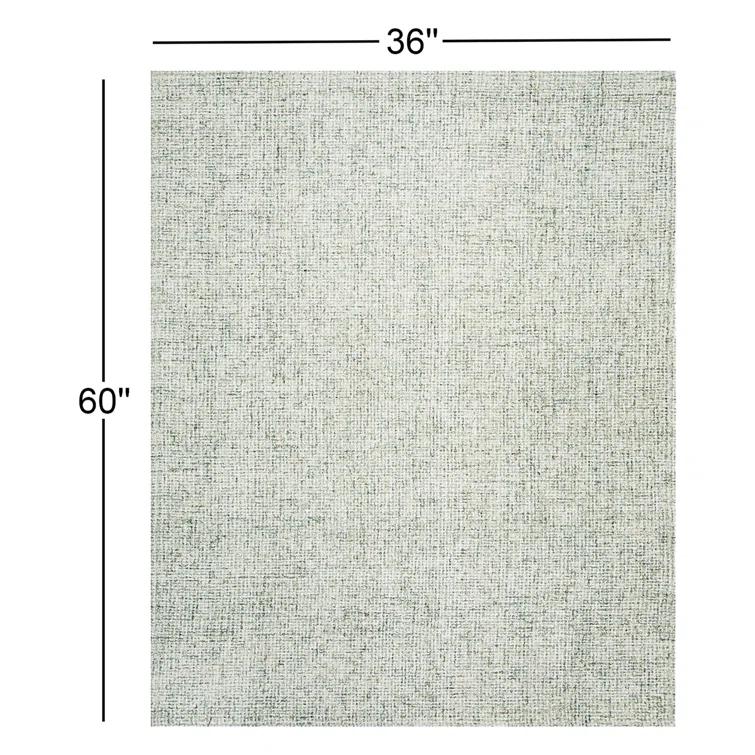 Britley Handmade Tufted Wool Area Rug in Light Green/Ivory