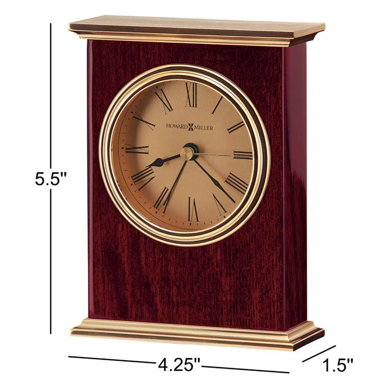 Howard Miller® Laurel Traditional Roman Numeral Wood Quartz Movement / Crystal Tabletop Clock with Alarm in Rosewood Hall/Polished Brass