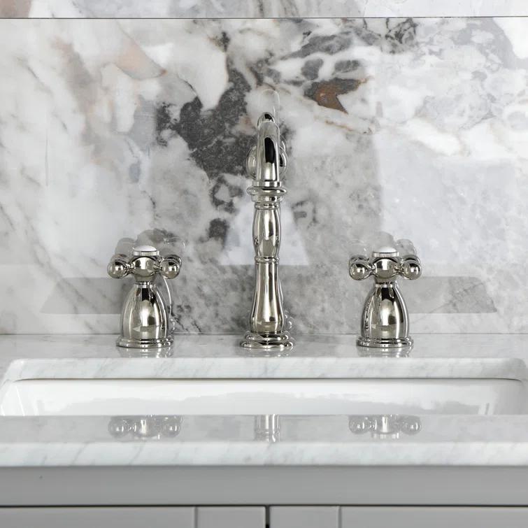 Kingston Brass Heritage Two-Handle 3-Hole Deck Mount Widespread Bathroom Faucet with Pop-Up Drain