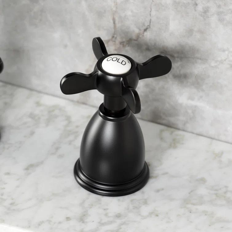 Kingston Brass Heritage Two-Handle 3-Hole Deck Mount Widespread Bathroom Faucet with Pop-Up Drain