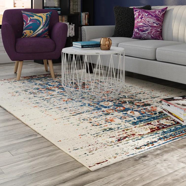 Hertzler Floral Ivory/Blue Area Rug