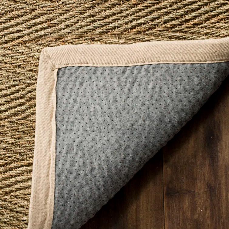 Deschamps Natural Fiber Seagrass Solid Color Rug