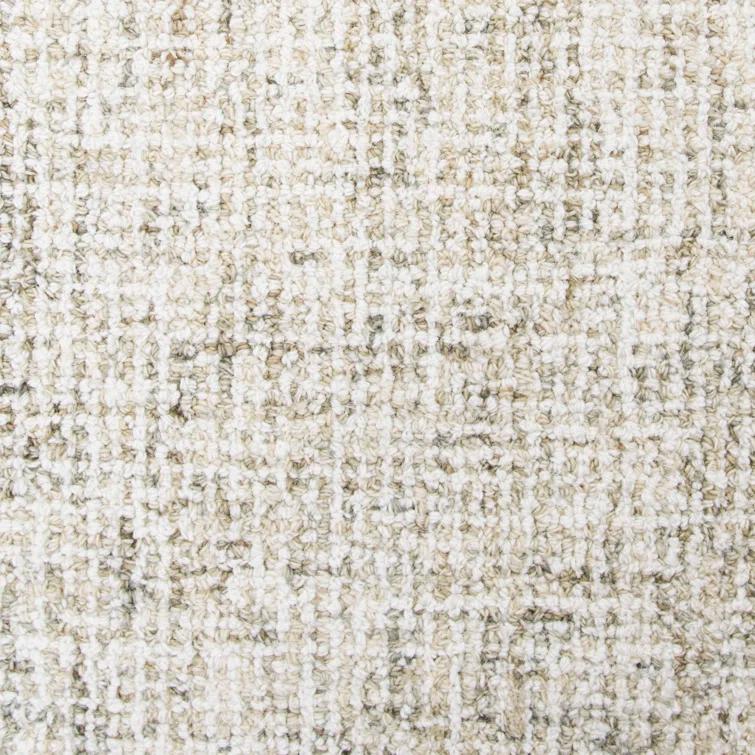 Britley Handmade Tufted Wool Beige Area Rug