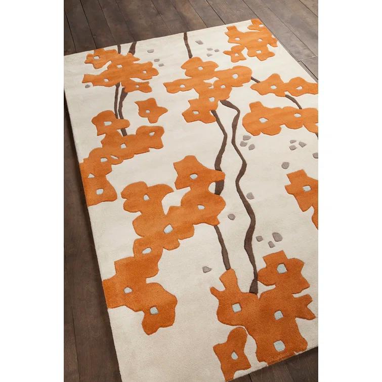 Handmade White and Orange Floral Wool Area Rug 5' x 7'