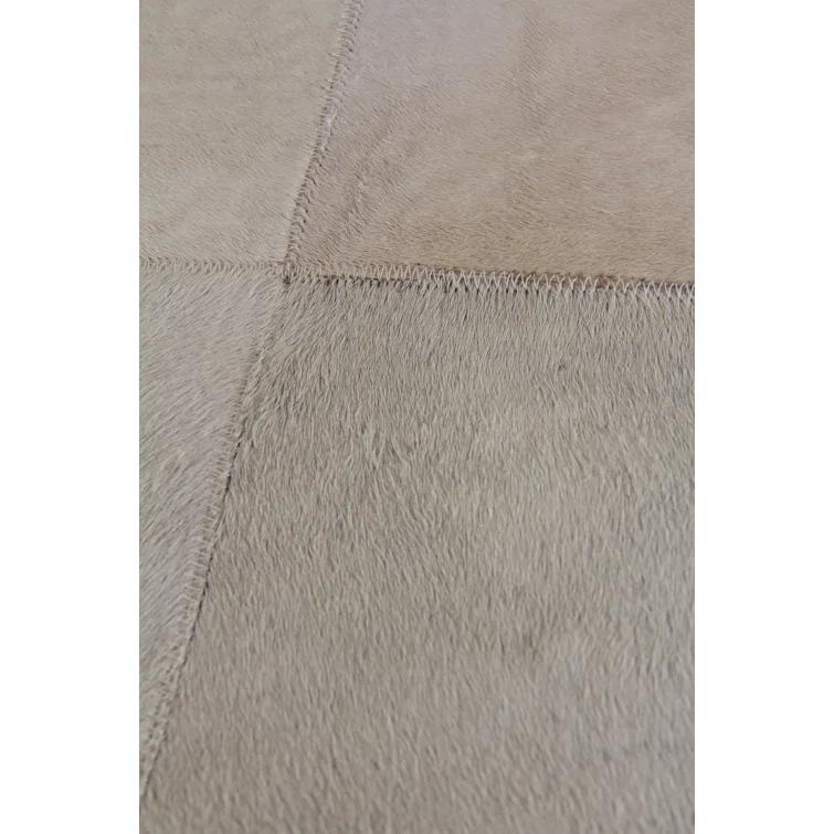 Exquisite Rugs Natural Hide Hand Stitched Leather Hide on Felt White Area Rug & Reviews | Wayfair