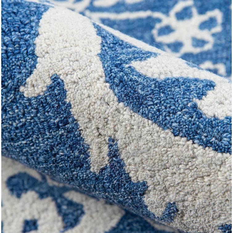 Cece Oriental Handmade Tufted Wool Blue/White Area Rug
