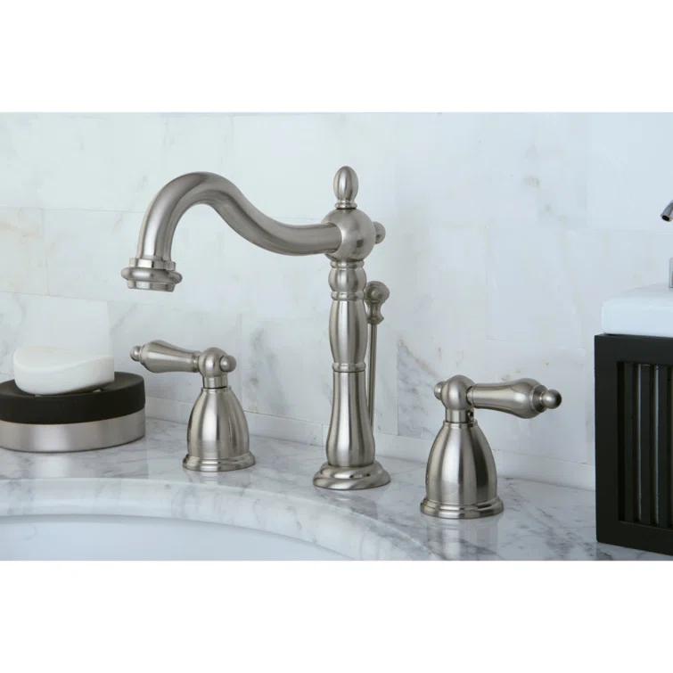 Kingston Brass Heritage Two-Handle 3-Hole Deck Mount Widespread Bathroom Faucet with Pop-Up Drain