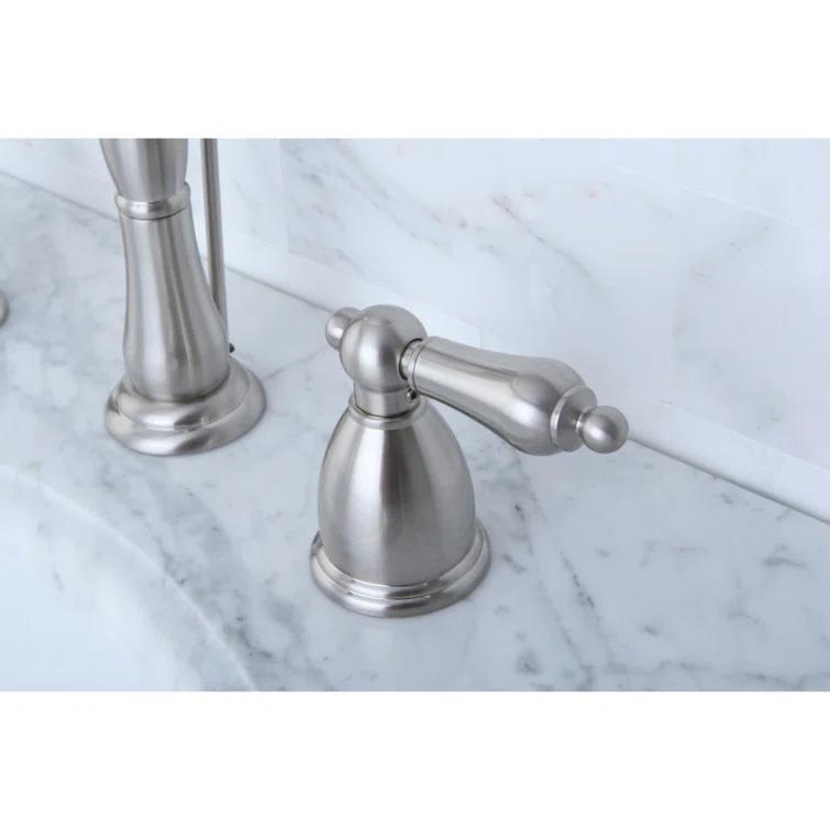 Kingston Brass Heritage Two-Handle 3-Hole Deck Mount Widespread Bathroom Faucet with Pop-Up Drain