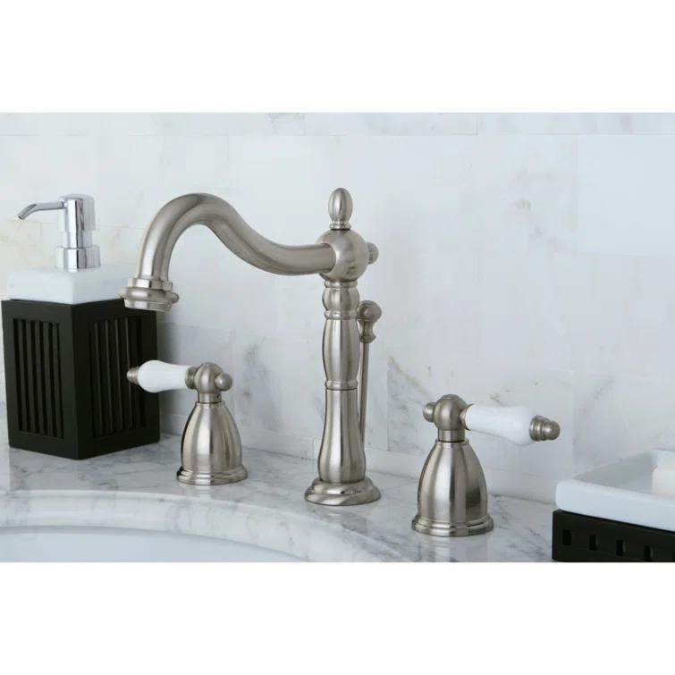Kingston Brass Heritage Two-Handle 3-Hole Deck Mount Widespread Bathroom Faucet with Pop-Up Drain