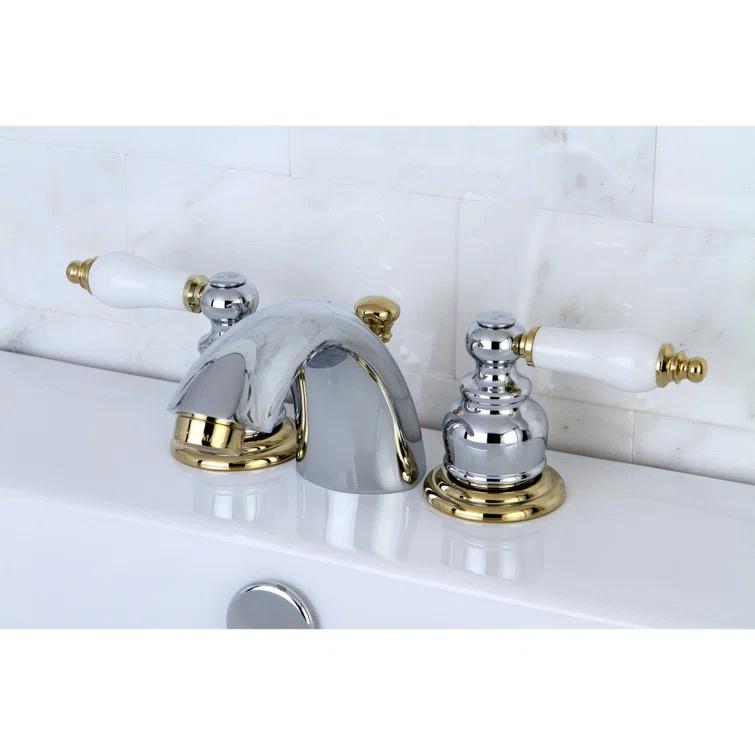 Kingston Brass Victorian Two-Handle 3-Hole Deck Mount Mini-Widespread Bathroom Faucet with Plastic Pop-Up