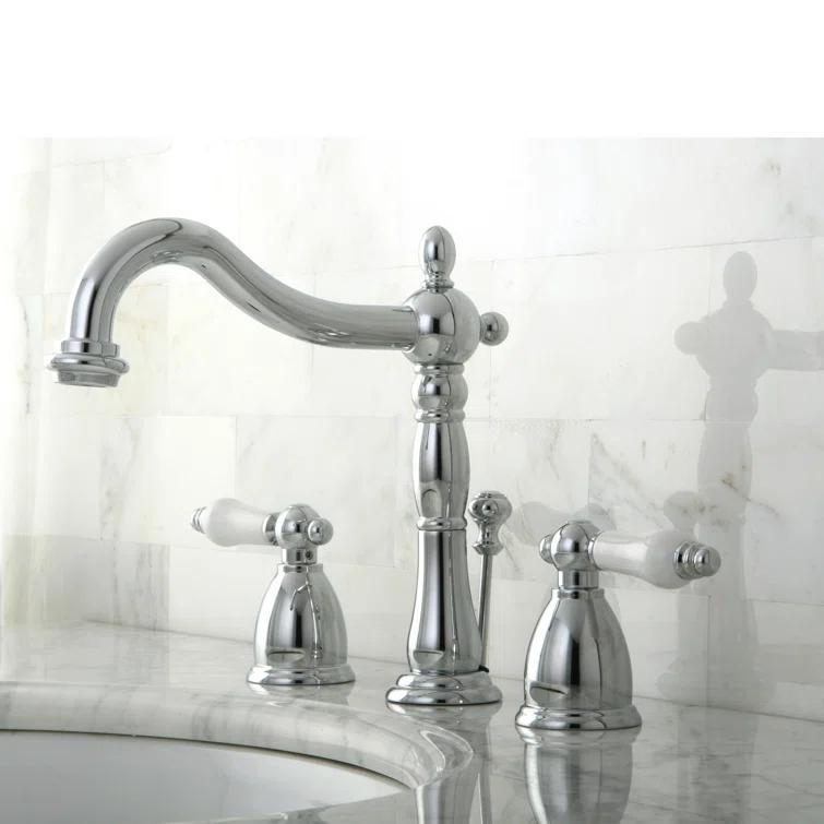 Kingston Brass Heritage Two-Handle 3-Hole Deck Mount Widespread Bathroom Faucet with Pop-Up Drain