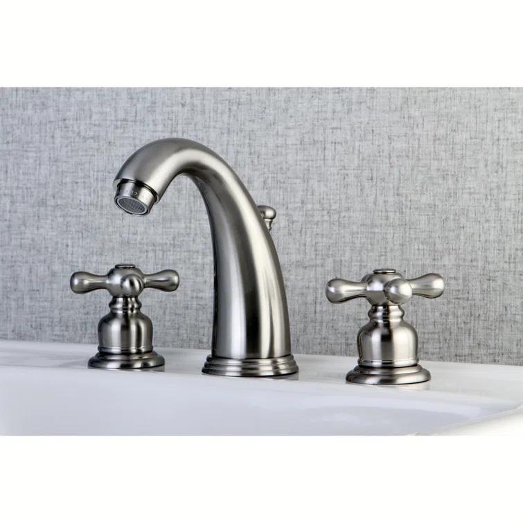 Kingston Brass Victorian Two-Handle 3-Hole Deck Mount Widespread Bathroom Faucet with Retail Pop-Up Drain